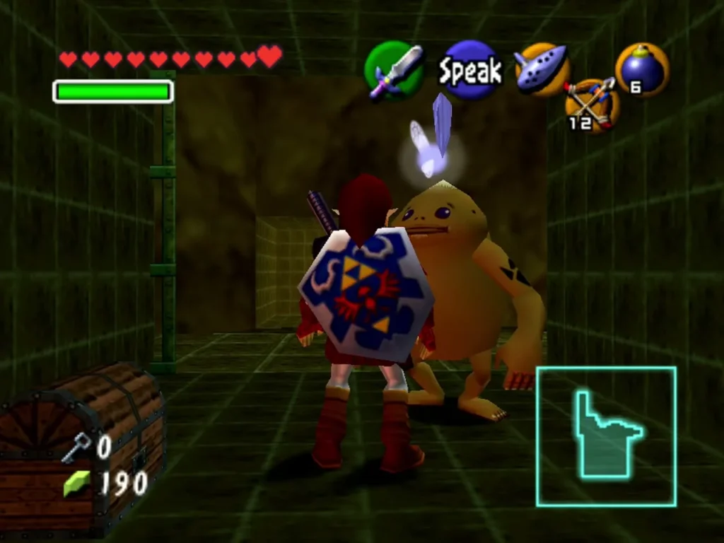 Link facing a caged Goron and a chest, with the Speak prompt showing in the Fire Temple Link facing a caged Goron and a chest, with the Speak prompt showing in the Fire Temple