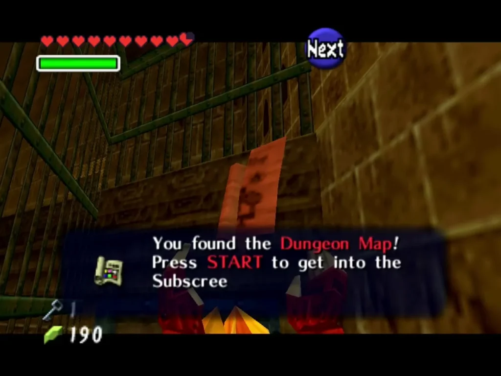 The Dungeon Map item box in the Fire Temple, with Link holding the map after the chest is opened The Dungeon Map item box in the Fire Temple, with Link holding the map after the chest is opened