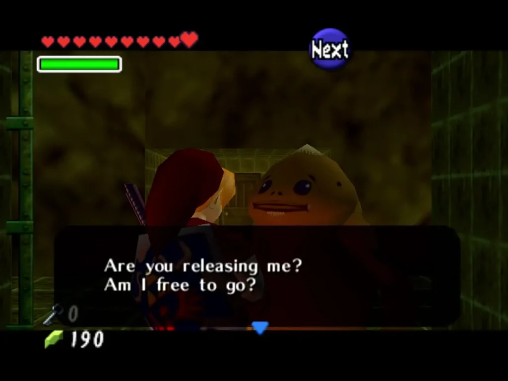 The freed Goron in his cell saying he is free to go, Link beside him in the Fire Temple The freed Goron in his cell saying he is free to go, Link beside him in the Fire Temple