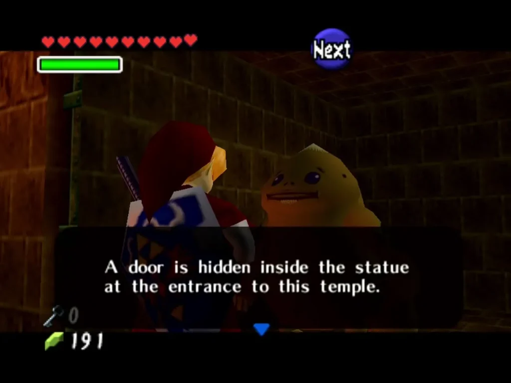 Goron in the cell telling Link a door is hidden inside the statue Goron in the cell telling Link a door is hidden inside the statue