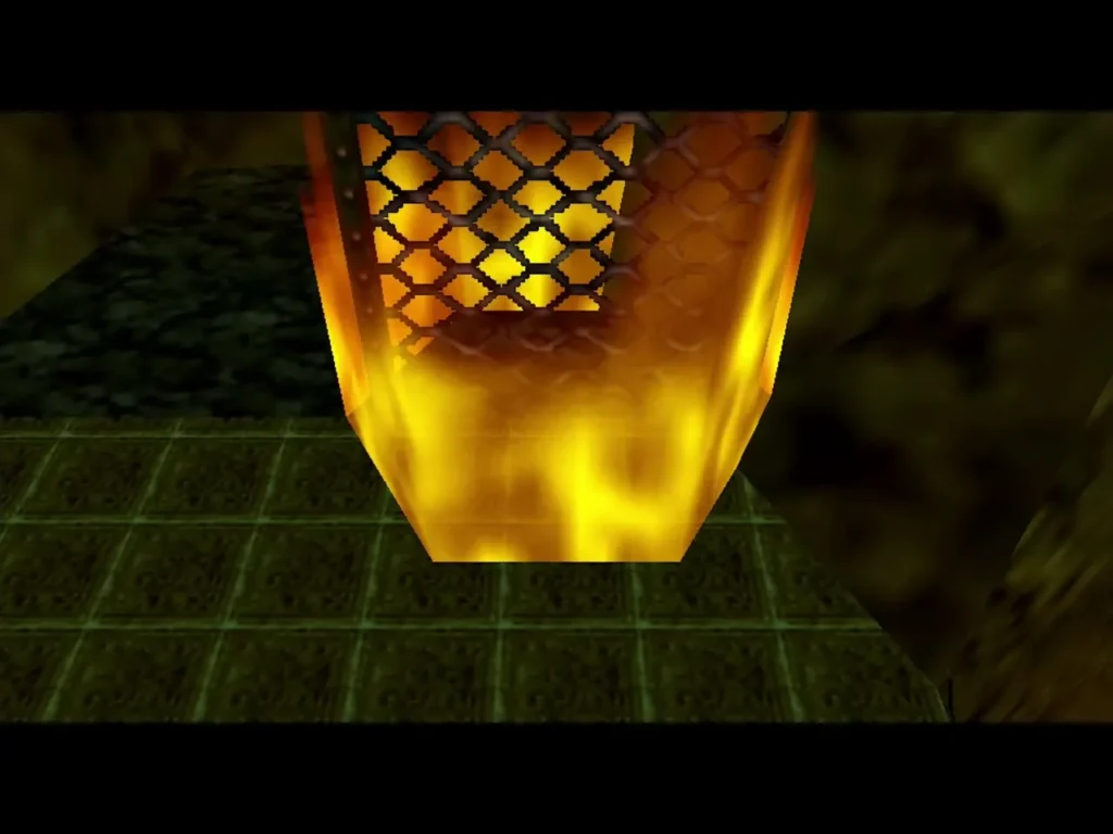 Flames burning beneath a metal grate in the Fire Temple Flames burning beneath a metal grate in the Fire Temple