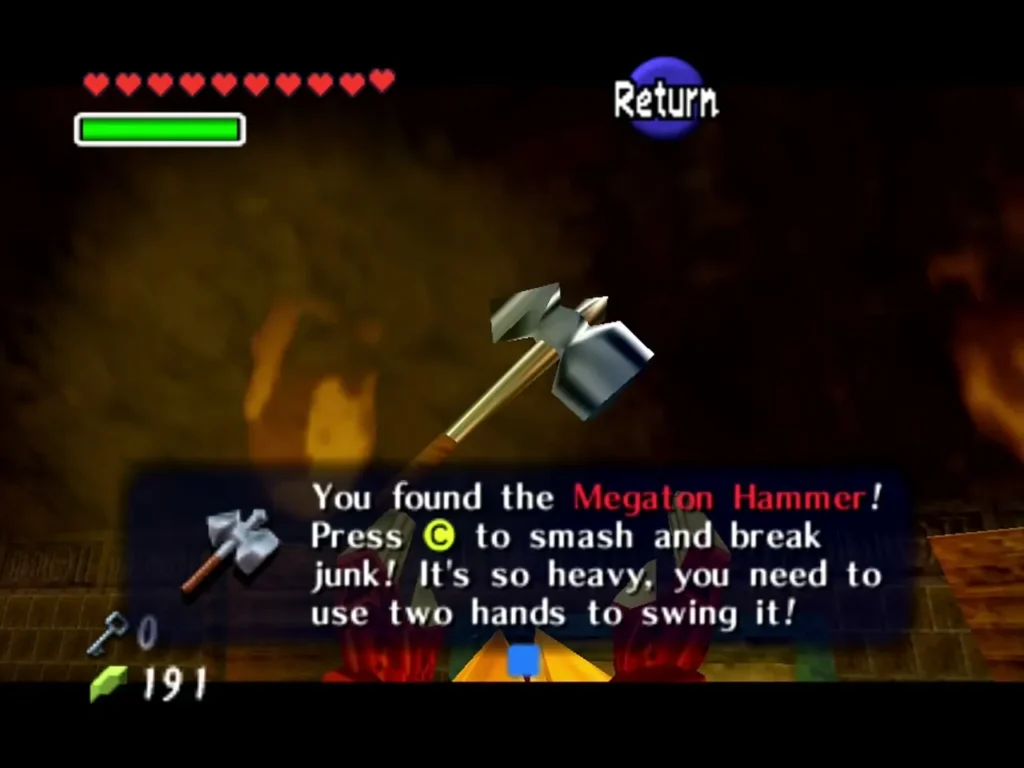 Link holding up the Megaton Hammer in the spiral room of the Fire Temple Link holding up the Megaton Hammer in the spiral room of the Fire Temple
