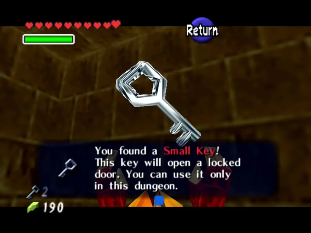 Link holding up a Small Key with the complete You found a Small Key box in the Fire Temple Link holding up a Small Key with the complete You found a Small Key box in the Fire Temple