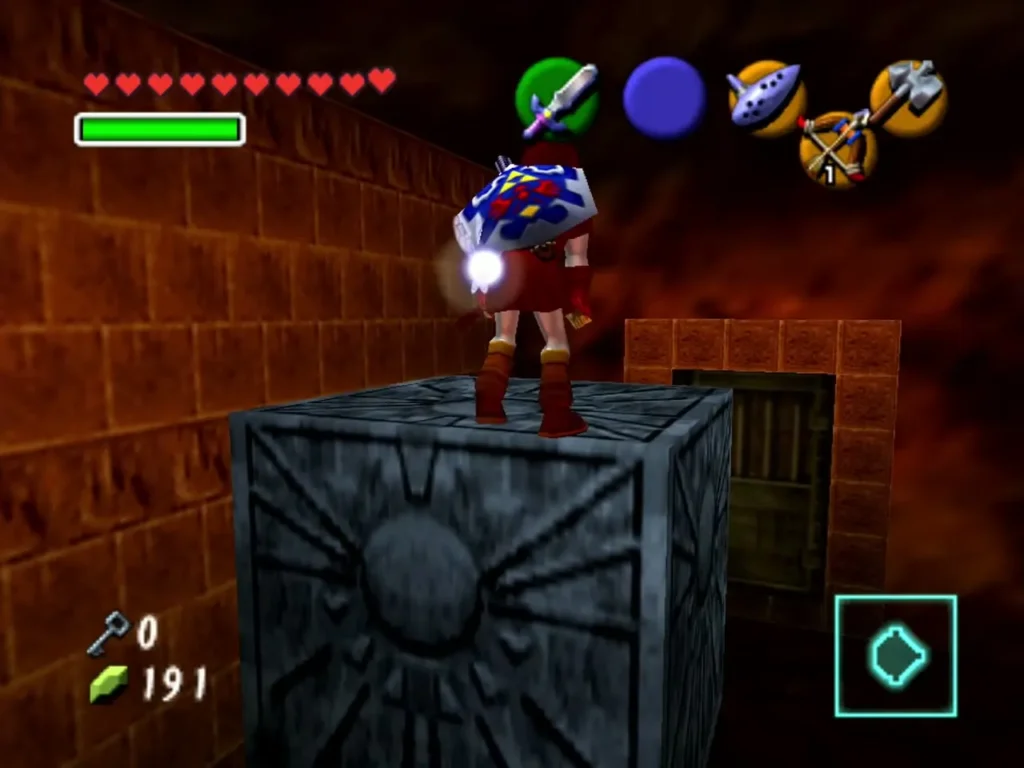 Link standing atop a carved stone block beside a barred door in Fire Temple Link standing atop a carved stone block beside a barred door in Fire Temple