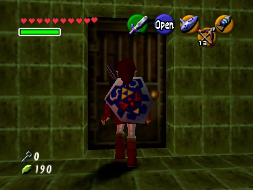 Link stepping toward an open door at the top of the grate section in the Fire Temple Link stepping toward an open door at the top of the grate section in the Fire Temple