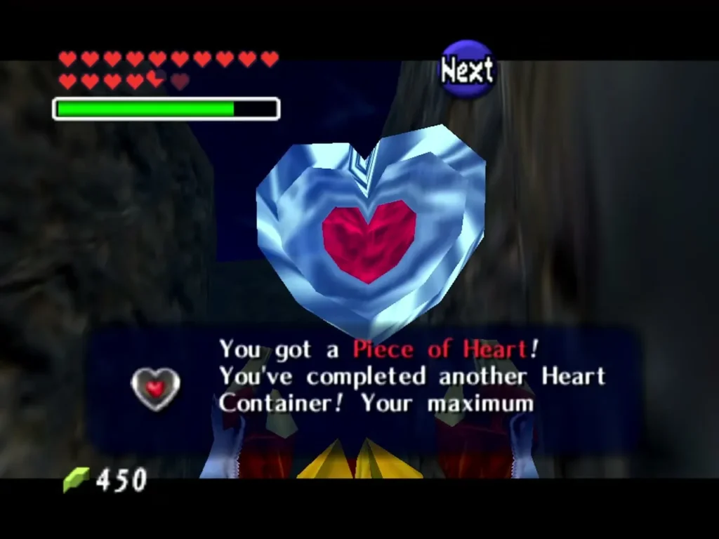 Link holding up the Piece of Heart from the crate with the message box shown Link holding up the Piece of Heart from the crate with the message box shown