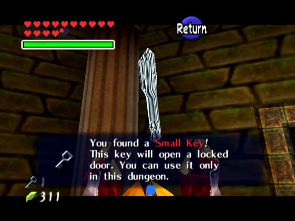 Link holding up a Small Key with the complete You found a Small Key message Link holding up a Small Key with the complete You found a Small Key message