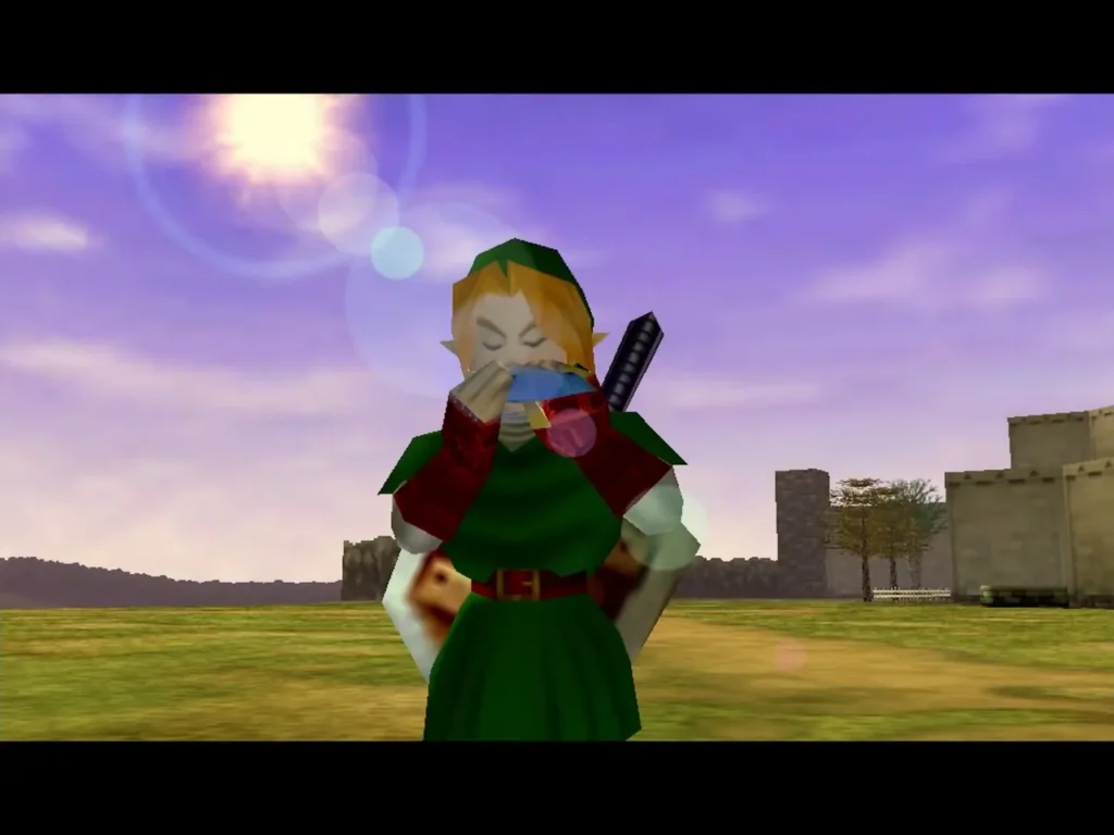 Link playing the Ocarina in Hyrule Field at sunset