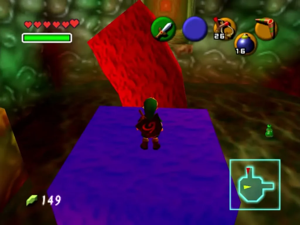 Link standing on a blue jelly-like platform beside a red block in Jabu-Jabu's Belly