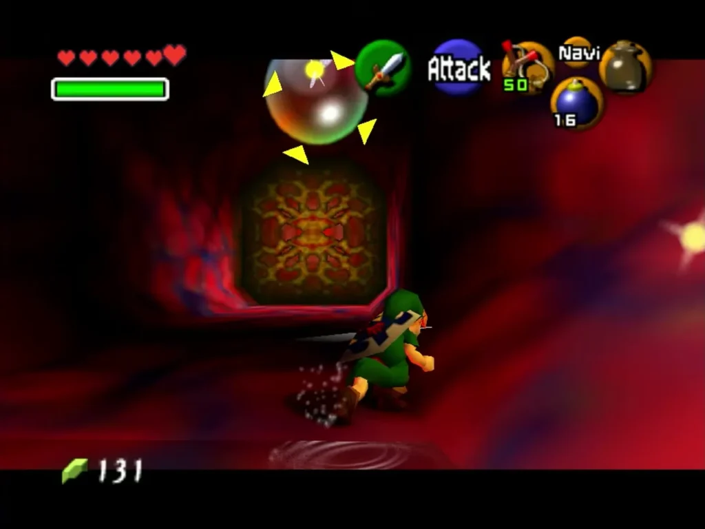 Link attacking a floating bubble enemy beside a slime-covered door