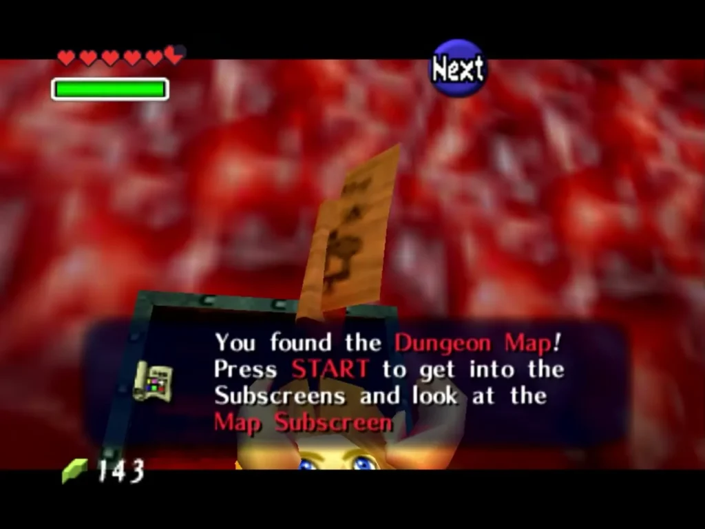 Link raising the Dungeon Map after opening the chest in Jabu-Jabu's Belly