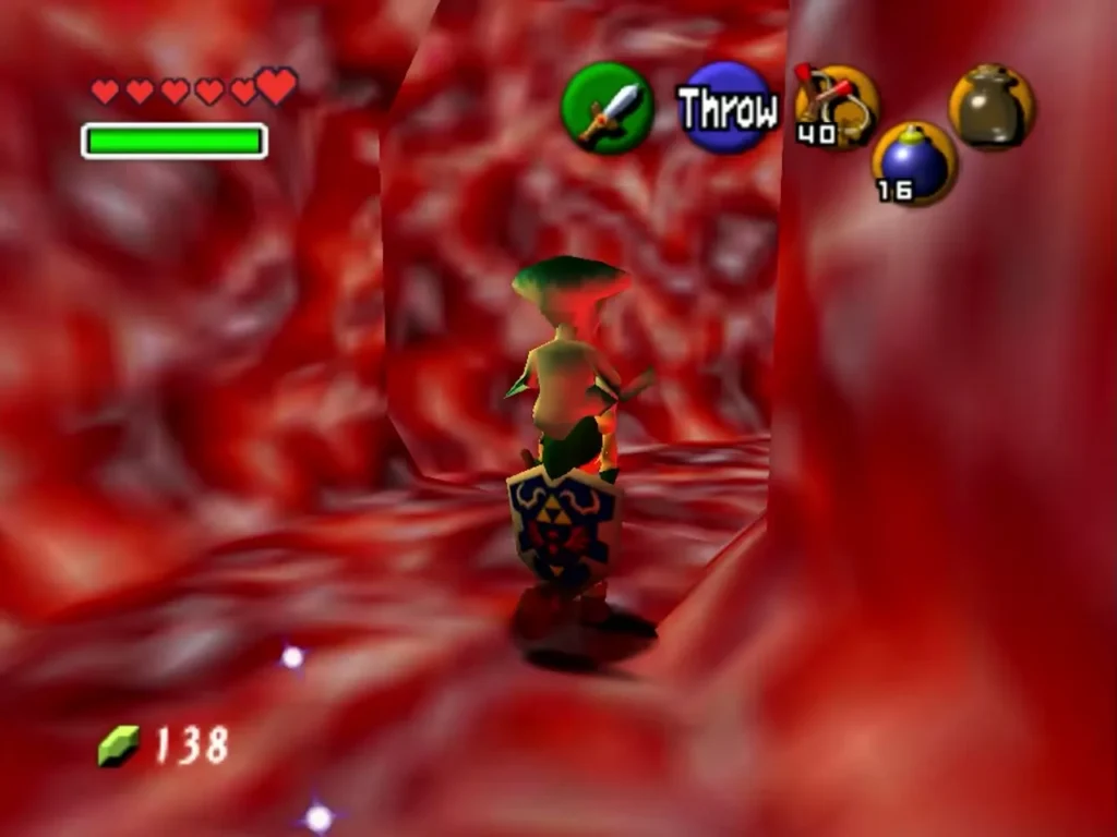 Link holding Princess Ruto overhead in the red corridor