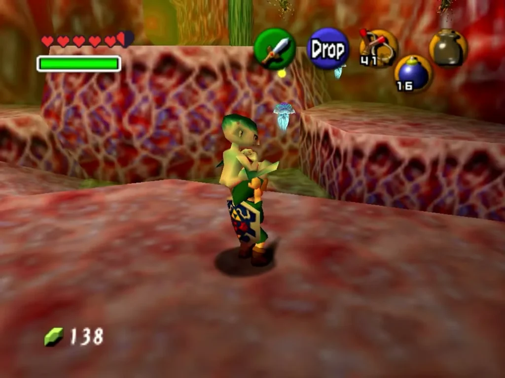 Link holding Princess Ruto up overhead in the red tunnel