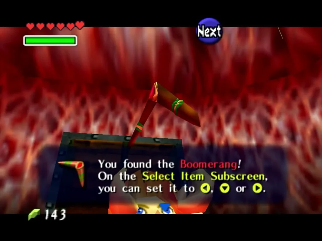 Link holding up the Boomerang found in a chest in Inside Jabu-Jabu's Belly with the message box in full Link holding up the Boomerang found in a chest in Inside Jabu-Jabu's Belly with the message box in full