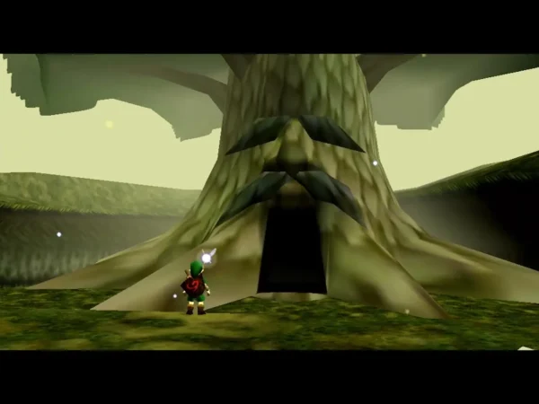 The Great Deku Tree rising from the grass with a dark doorway at its base The Great Deku Tree rising from the grass with a dark doorway at its base