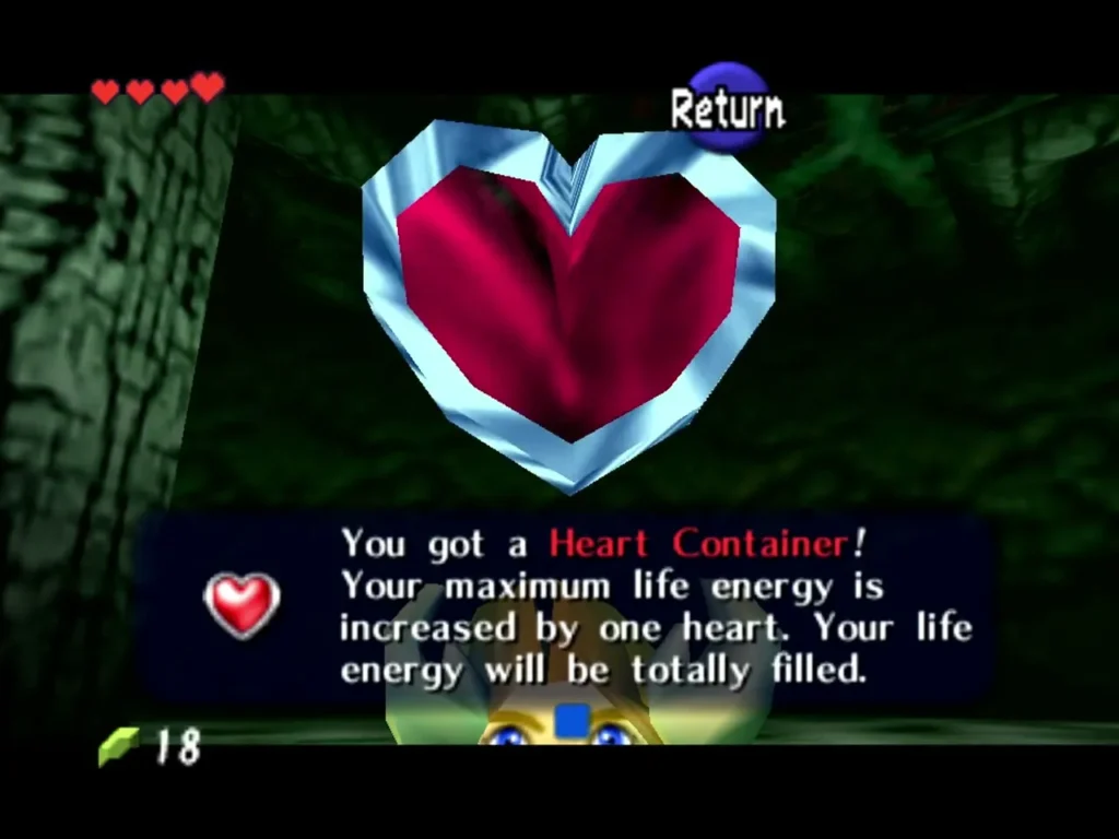 Link holding up a Heart Container with the complete You got a Heart Container box in the Deku Tree Link holding up a Heart Container with the complete You got a Heart Container box in the Deku Tree
