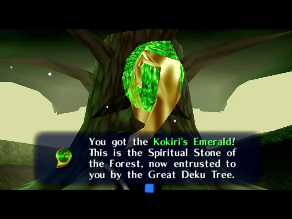 Link receiving the Kokiri's Emerald with the complete item box beside the Great Deku Tree Link receiving the Kokiri's Emerald with the complete item box beside the Great Deku Tree