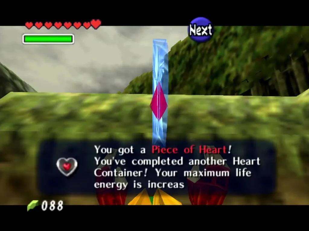 The Piece of Heart rising over the Graveyard ledge with the item message shown The Piece of Heart rising over the Graveyard ledge with the item message shown
