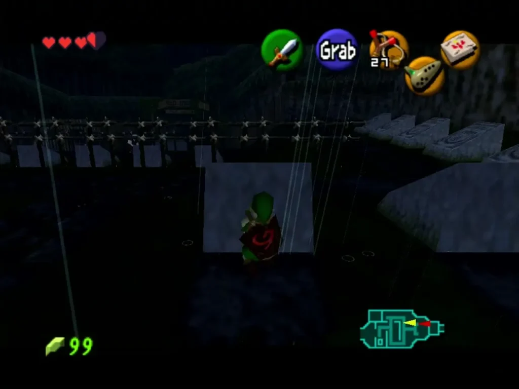 Link at night in the Graveyard with the Grab prompt beside a grave Link at night in the Graveyard with the Grab prompt beside a grave