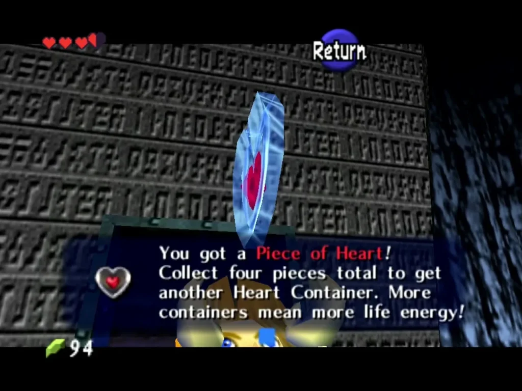 Link holding the Piece of Heart from the tomb chest with the item message fully shown Link holding the Piece of Heart from the tomb chest with the item message fully shown