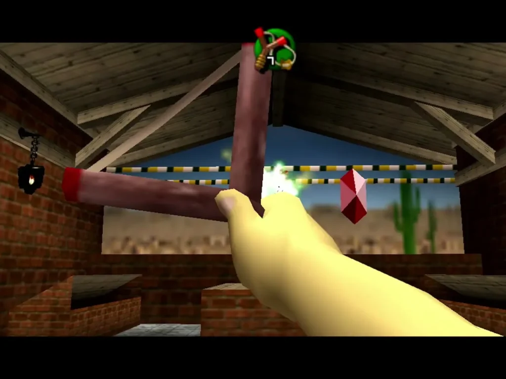 Link firing the Slingshot at a red Rupee target in the Market Shooting Gallery Link firing the Slingshot at a red Rupee target in the Market Shooting Gallery