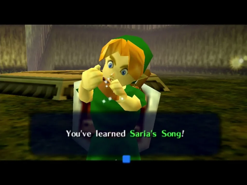 Link holds his Ocarina after the message You've learned Saria's Song Link holds his Ocarina after the message You've learned Saria's Song