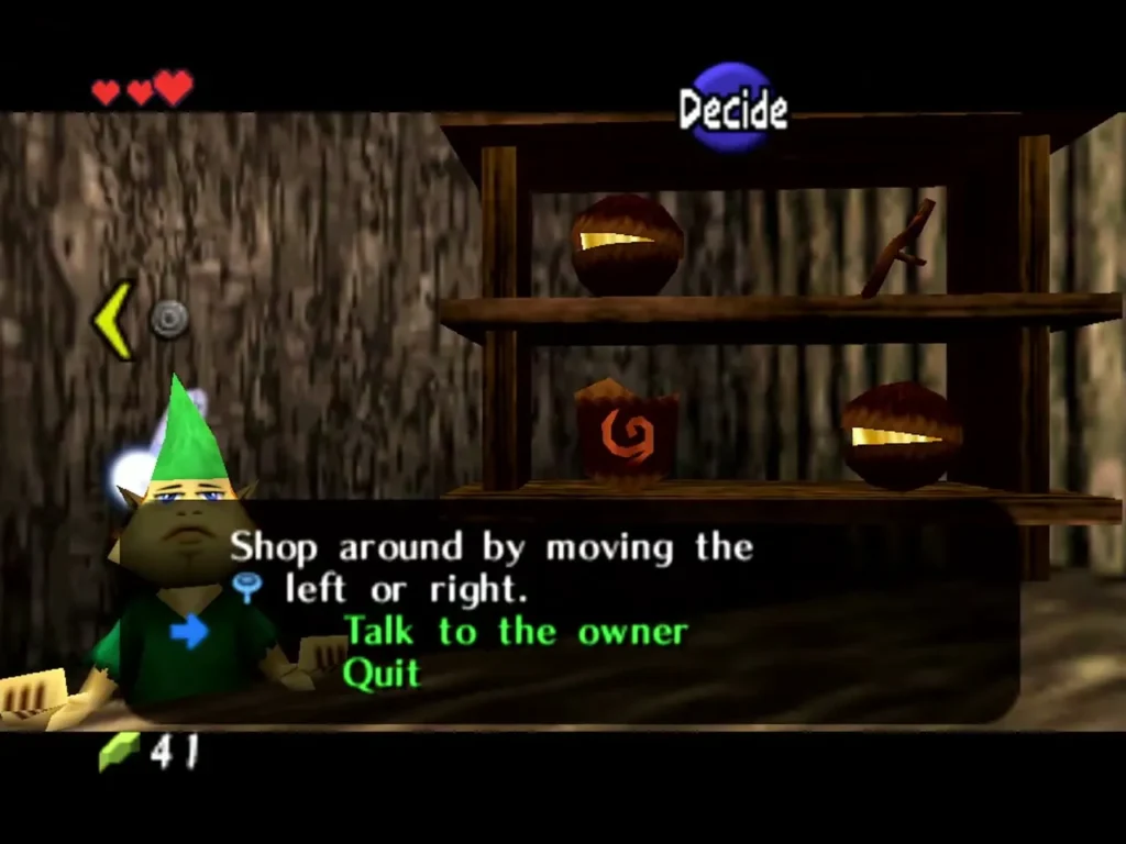 Shopkeeper in the Kokiri Shop with the prompt to shop around or talk Shopkeeper in the Kokiri Shop with the prompt to shop around or talk