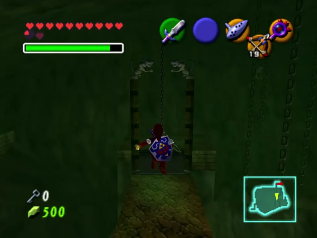 Link standing under a guillotine blade hanging in a dark corridor of the Shadow Temple Link standing under a guillotine blade hanging in a dark corridor of the Shadow Temple