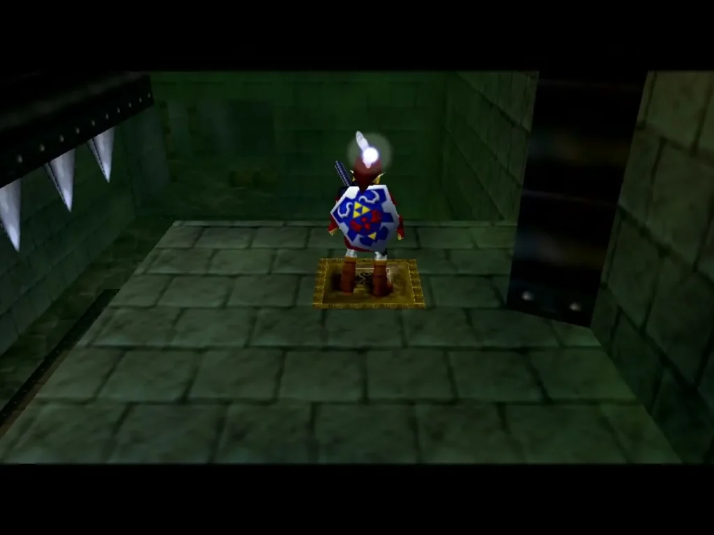 Link stepping onto the floor switch in a stone room of the Shadow Temple Link stepping onto the floor switch in a stone room of the Shadow Temple