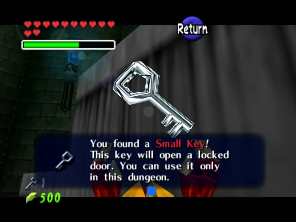 Link holding up a Small Key with the You found a Small Key message box shown Link holding up a Small Key with the You found a Small Key message box shown