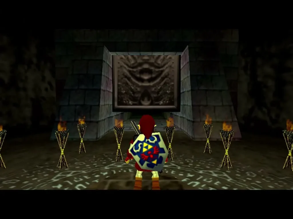 Shadow Temple torch room with all the torches lit and the big door at the far end Shadow Temple torch room with all the torches lit and the big door at the far end