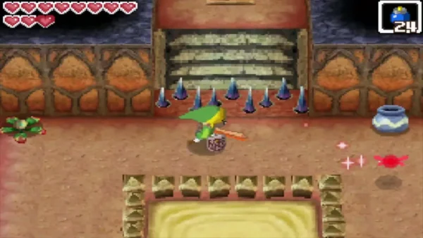 Raised floor spikes in front of a staircase in a Goron Temple hall Raised floor spikes in front of a staircase in a Goron Temple hall