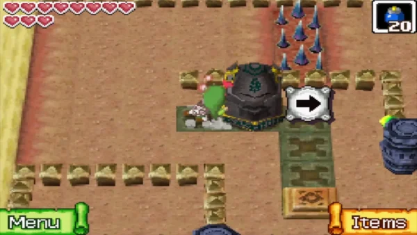 Link pushing a statue past a patch of raised floor spikes Link pushing a statue past a patch of raised floor spikes