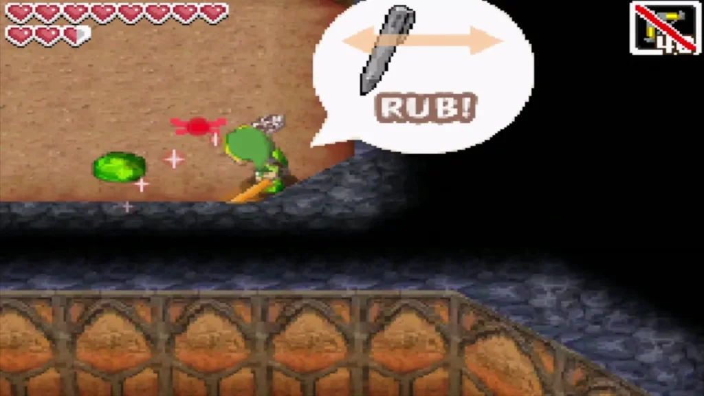 A green Gel beside Link with a prompt to rub the screen to shake it off A green Gel beside Link with a prompt to rub the screen to shake it off
