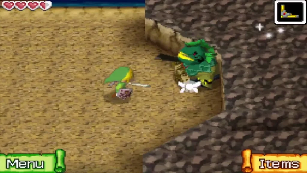 A Geozard standing at the edge of a rocky ledge as Link approaches across the sand A Geozard standing at the edge of a rocky ledge as Link approaches across the sand