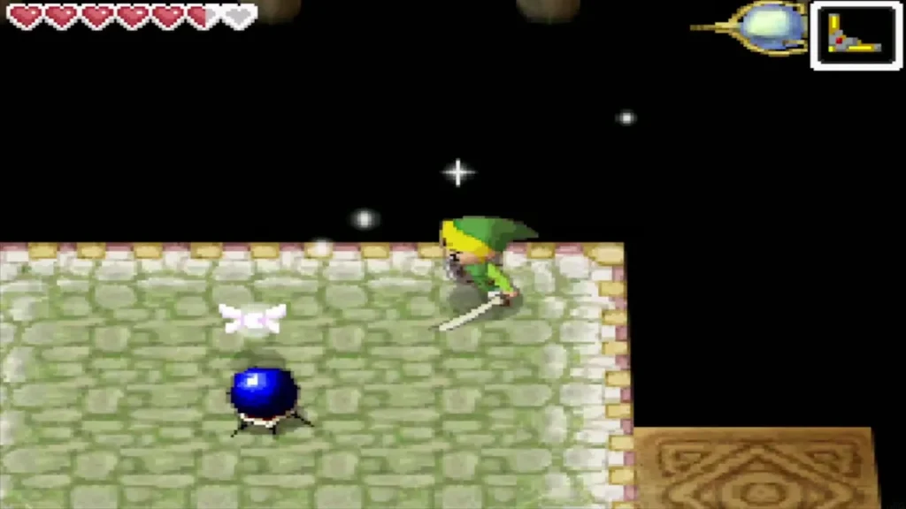 Link facing a blue Hardhat Beetle on a stone platform in the Temple of Courage Link facing a blue Hardhat Beetle on a stone platform in the Temple of Courage