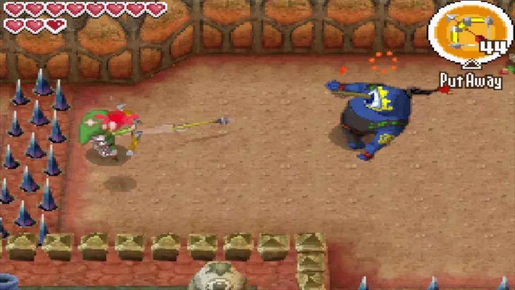 Link firing an arrow at a blue Hinox in a spiked room Link firing an arrow at a blue Hinox in a spiked room