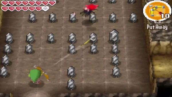 Link shooting a red Keese with the Bow among grey stone pillars Link shooting a red Keese with the Bow among grey stone pillars
