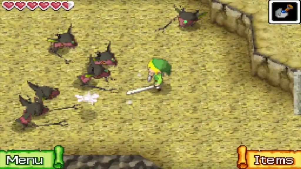 Link fighting a pack of Miniblins in a sandy cave Link fighting a pack of Miniblins in a sandy cave