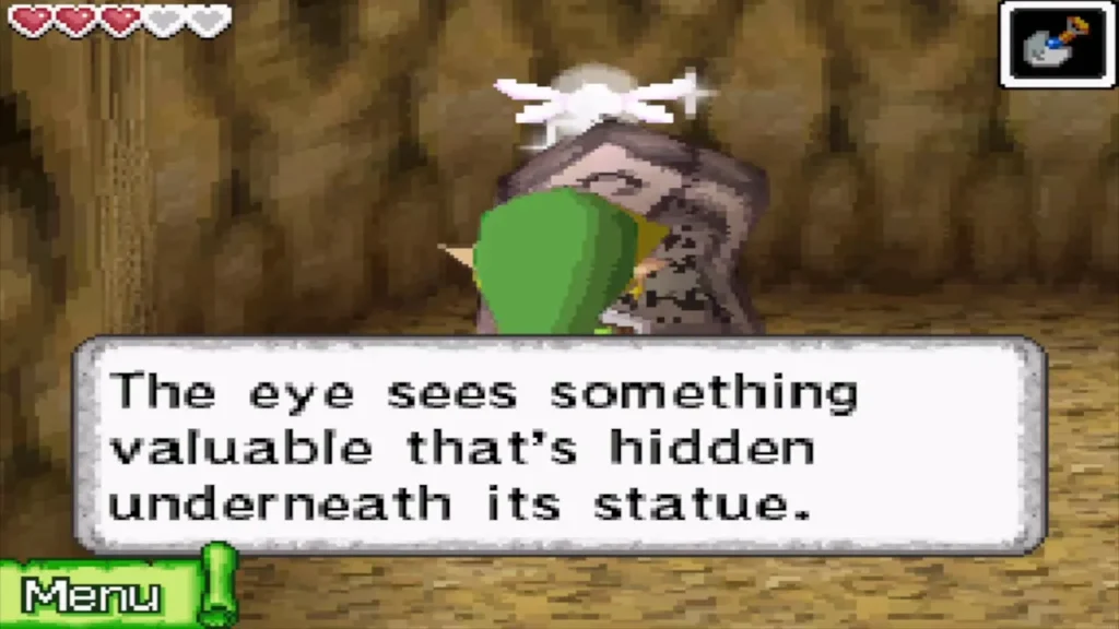 Link reading the hint about the eye statue in the Uncharted Island tunnel Link reading the hint about the eye statue in the Uncharted Island tunnel