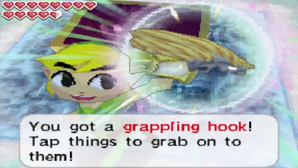 Link holding up the grappling hook won in the Temple of Ice Link holding up the grappling hook won in the Temple of Ice