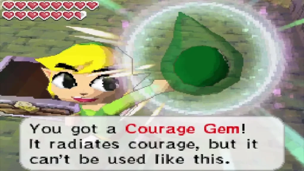 Link holding up a Courage Gem found on the Isle of Ruins Link holding up a Courage Gem found on the Isle of Ruins
