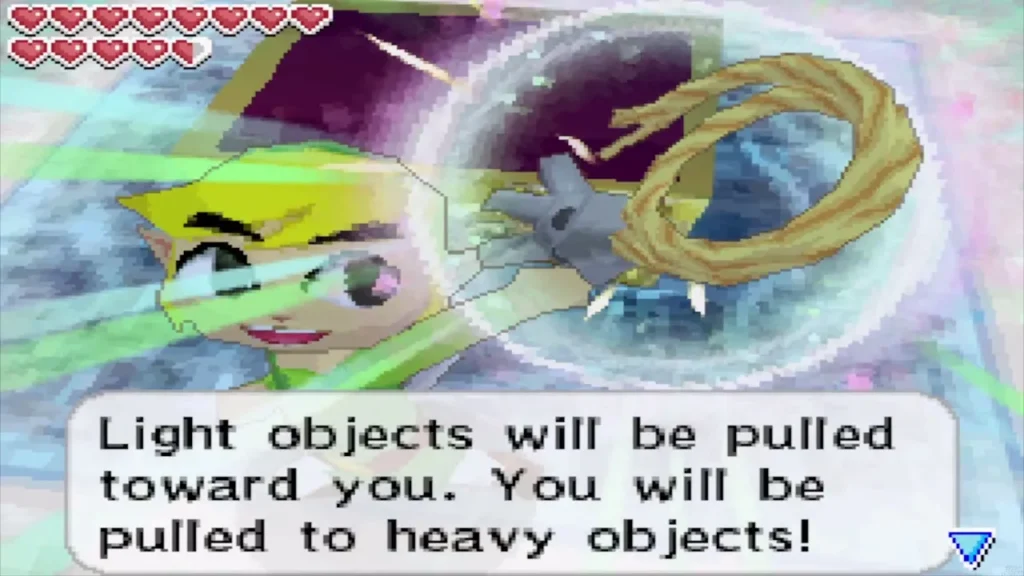 Link holds the rope-coiled hook as the message explains pulling light and heavy objects Link holds the rope-coiled hook as the message explains pulling light and heavy objects