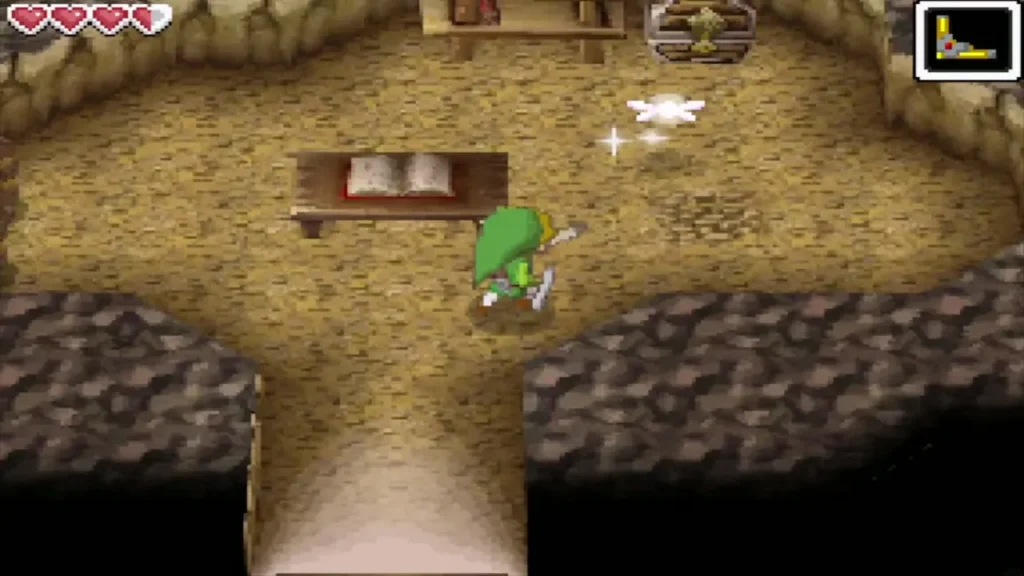Link walking into the dark hideaway cave on Molida Island toward a desk Link walking into the dark hideaway cave on Molida Island toward a desk