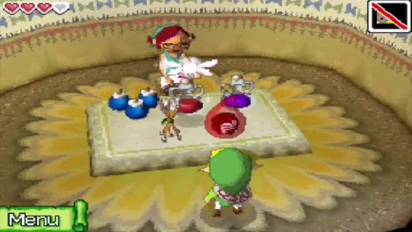 The Molida shopkeeper behind her counter of bombs and potions