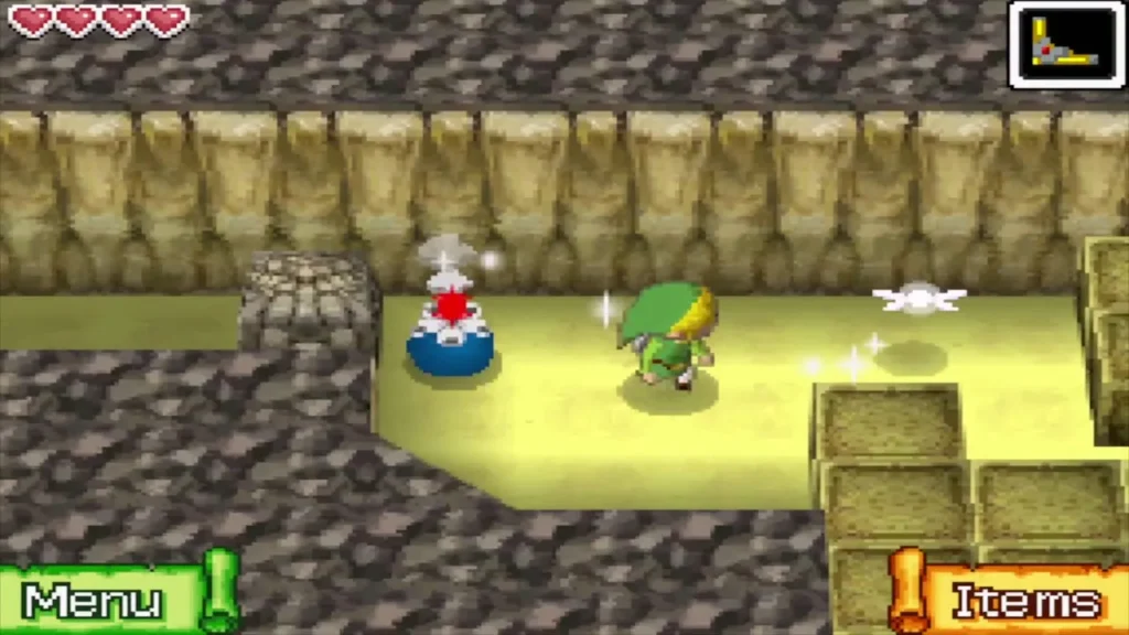 Link next to a Bomb Flower in the cave near the cracked rocks Link next to a Bomb Flower in the cave near the cracked rocks