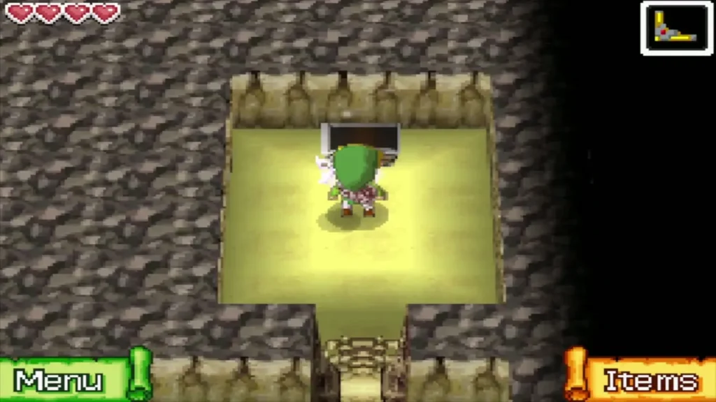 Link at the chest in the small cave chamber that holds the Power Gem Link at the chest in the small cave chamber that holds the Power Gem