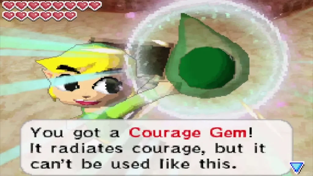 Link holds up the Courage Gem from the chest on the Goron home Link holds up the Courage Gem from the chest on the Goron home