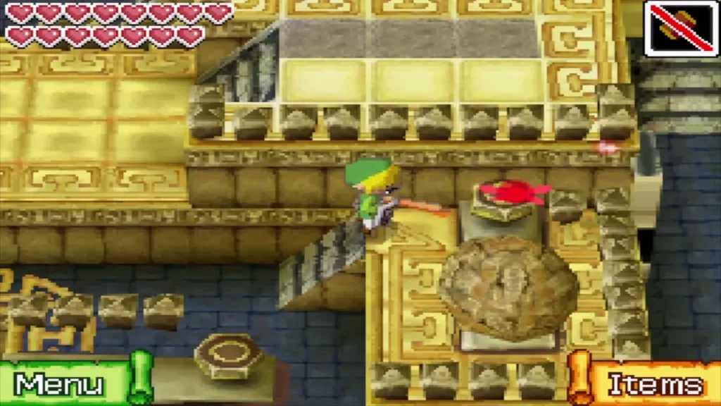A boulder resting on a ledge as Link strikes the switch above it A boulder resting on a ledge as Link strikes the switch above it