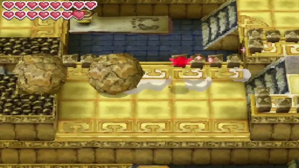 Two boulders on the top level, one ready to roll into the other Two boulders on the top level, one ready to roll into the other